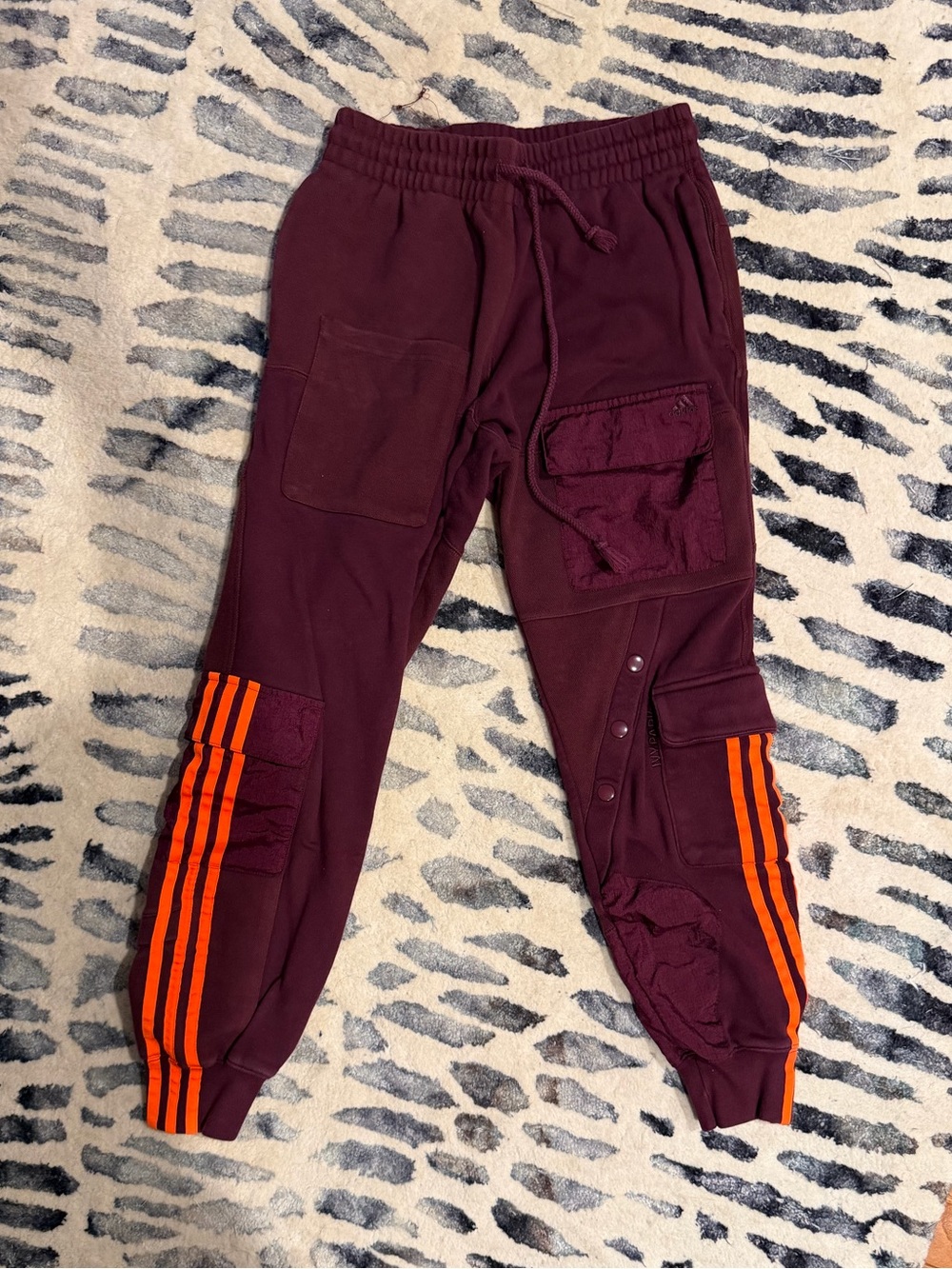 Adidas x IVY PARK Burgundy Track Joggers with Orange Stripes